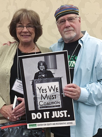 Gloria Nemerowicz receives the Do It Just award from Dennis Littky