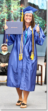 girl holding diploma